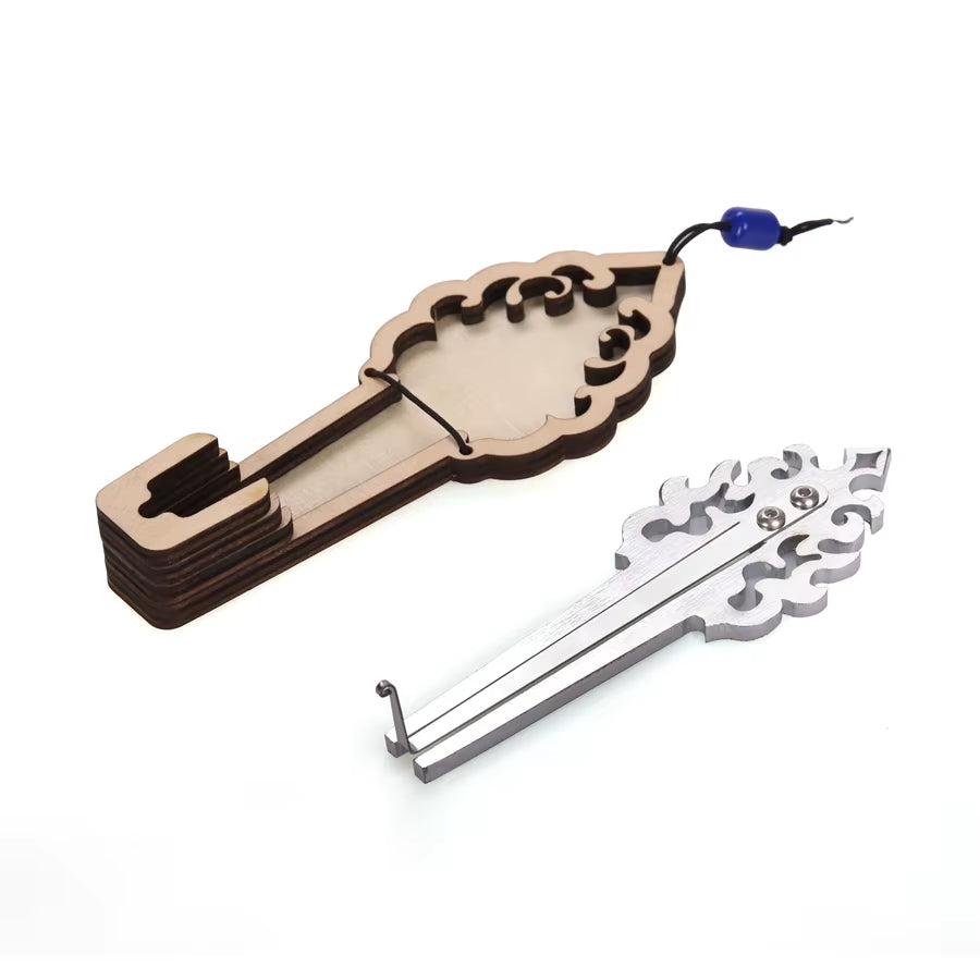 Decorative key with ornate scrollwork on Stainless Steel Jews Harp Mouth Jaw Harp