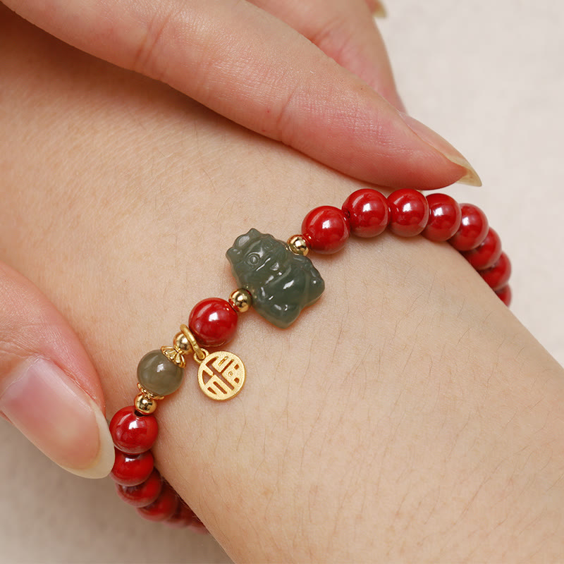 Sterling Silver Dragon Bracelet with Cinnabar & Jade Charms