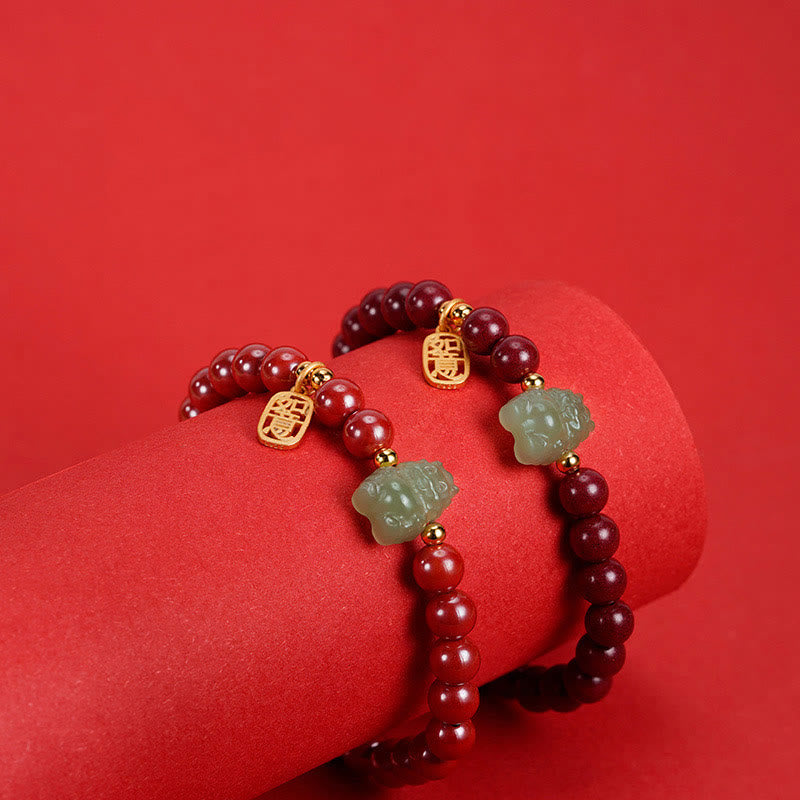 Sterling Silver Dragon Bracelet with Cinnabar & Jade Charms