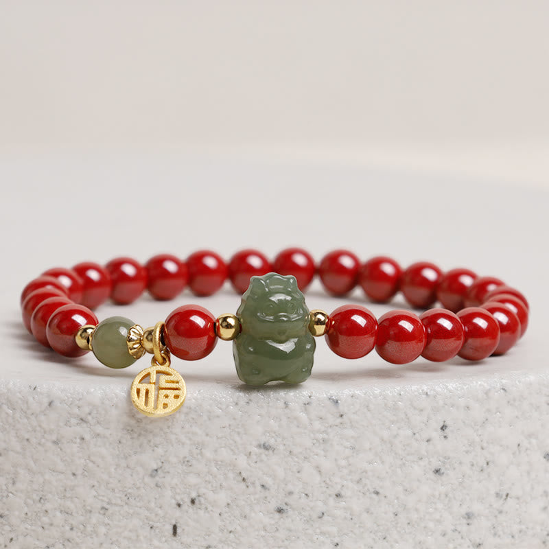 Sterling Silver Dragon Bracelet with Cinnabar & Jade Charms