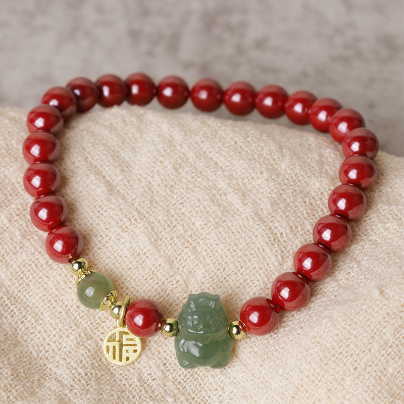 Sterling Silver Dragon Bracelet with Cinnabar & Jade Charms