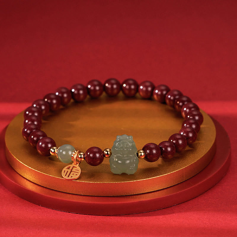 Sterling Silver Dragon Bracelet with Cinnabar & Jade Charms