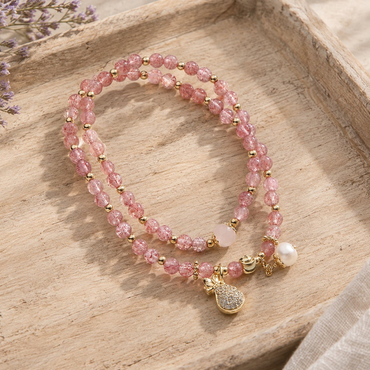 Double Wrap Strawberry Quartz Love Healing Bracelet, angled view