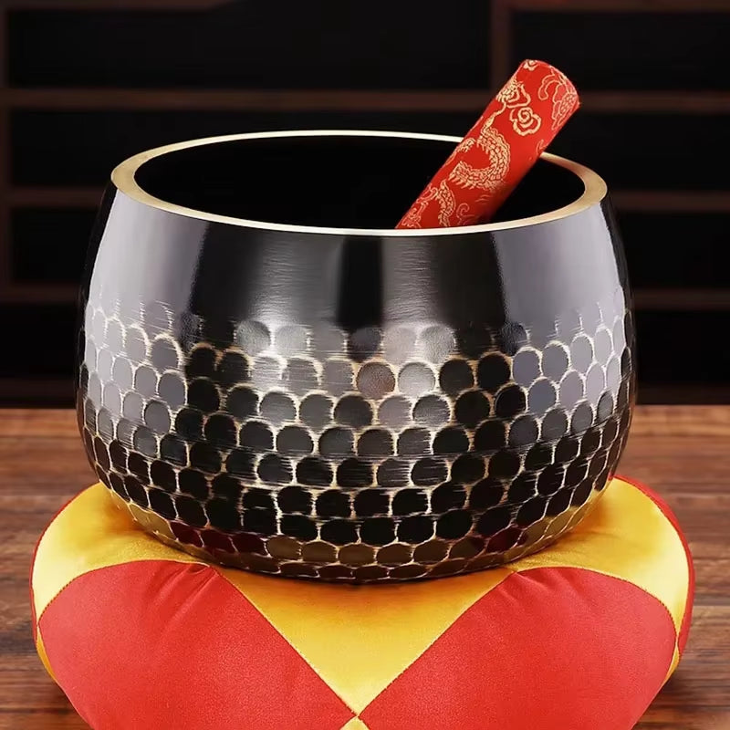 Tibetan Brass Singing Bowl with honeycomb pattern and red striker for meditation