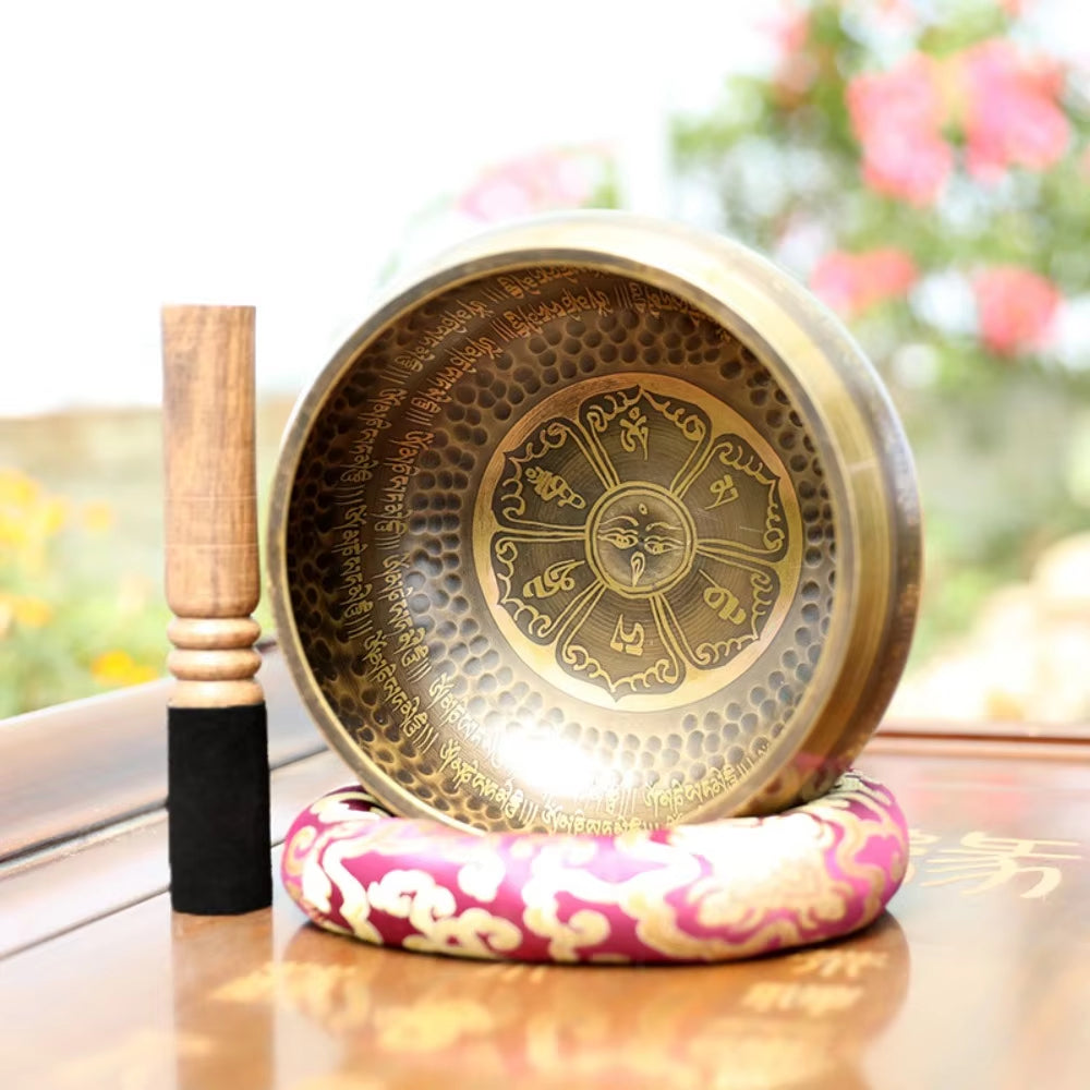 Tibetan Brass Singing Bowl with Mandala Design on Pink Cushion for Sound Healing