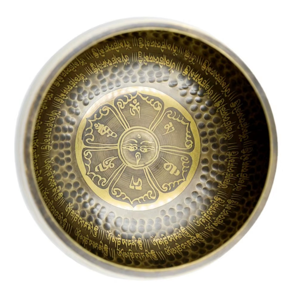 Decorative metal Tibetan Brass Singing Bowl features etched mandala design for sound healing