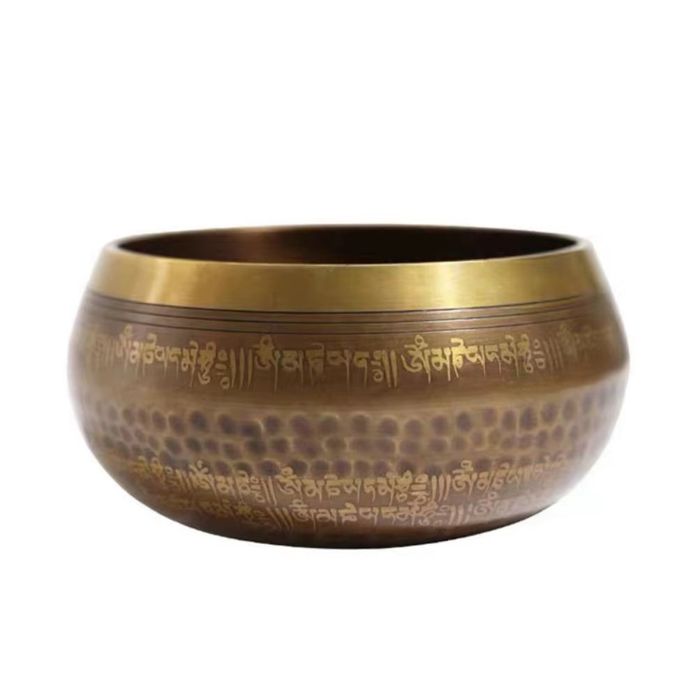 Tibetan Brass Singing Bowl featuring etched Sanskrit mantras and hammered texture