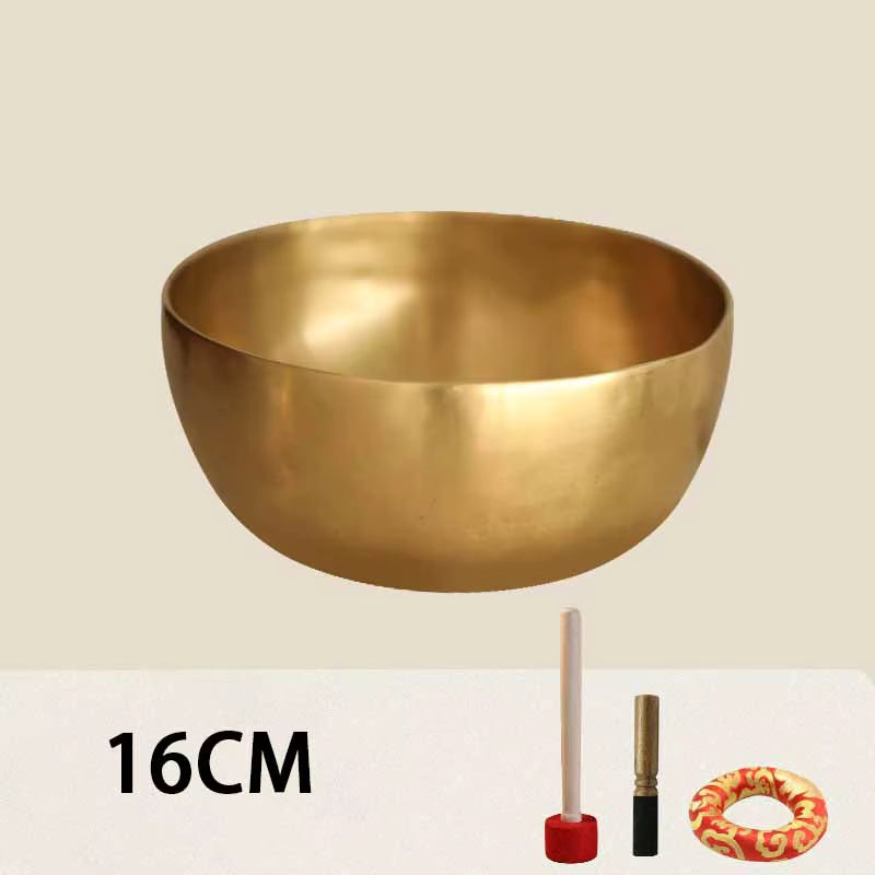 Golden brass singing bowl with polished finish for Tibetan Buddhist meditation sound healing