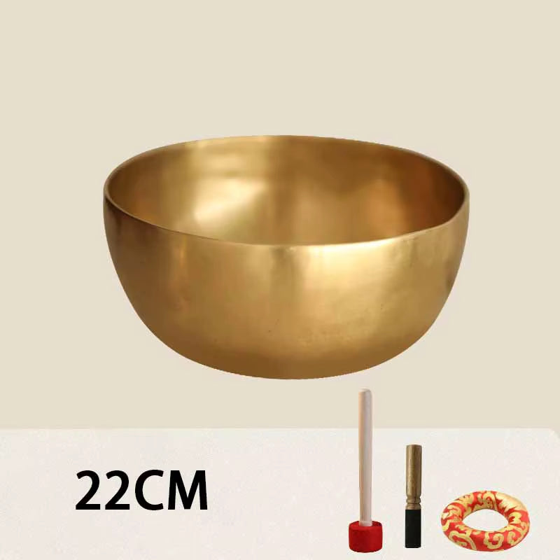 Golden metallic Tibetan Buddhist bowl for meditation and sound healing