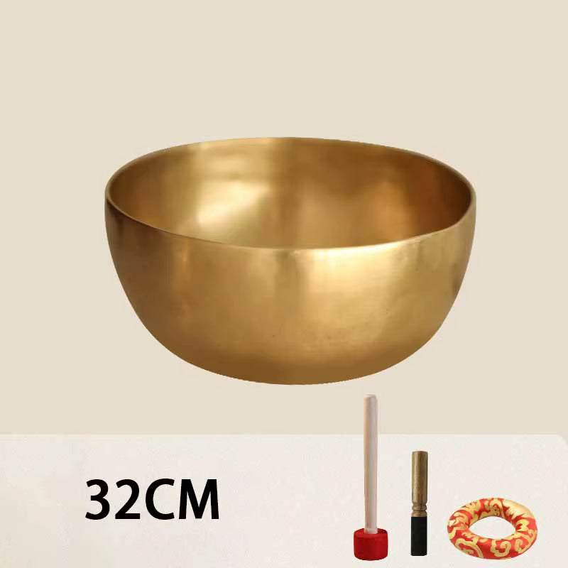 Golden singing bowl with matte metallic finish for Tibetan Buddhist meditation and sound healing