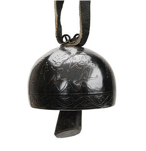 Black metal Tibetan meditation bell instrument with decorative etched patterns