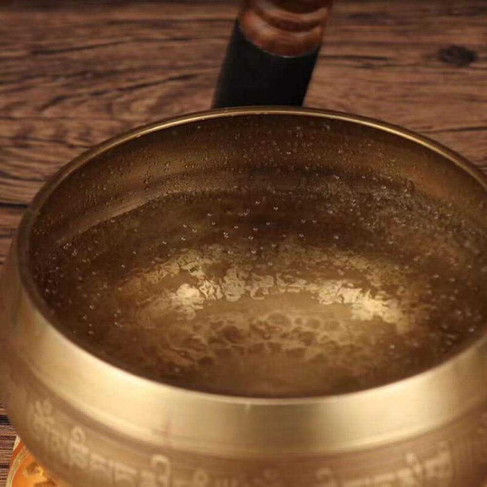 Metal Tibetan Singing Bowl with a hammered surface for meditation and relaxation