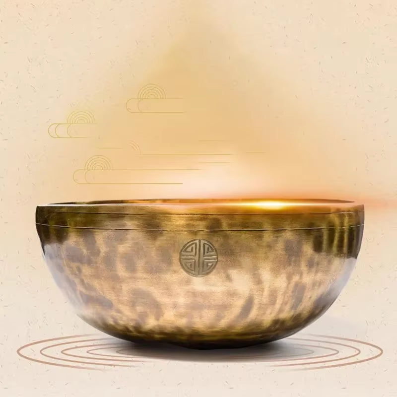 Hammered metal Tibetan Singing Bowl for meditation with ornate circular symbol