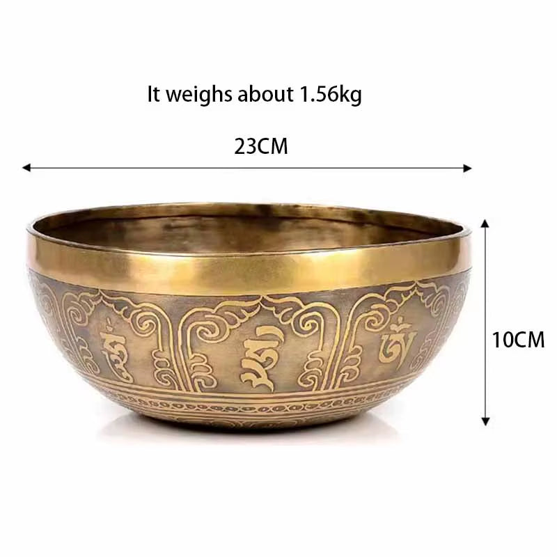 Decorative brass Tibetan singing bowl with intricate engravings for healing practices