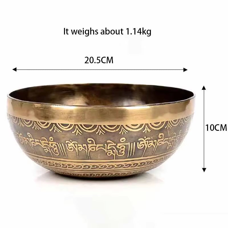 Bronze Tibetan singing bowl with etched Sanskrit mantras for healing and meditation