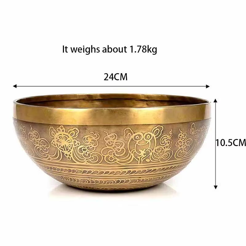 Brass Tibetan Singing Bowl with ornate floral engravings for healing practices