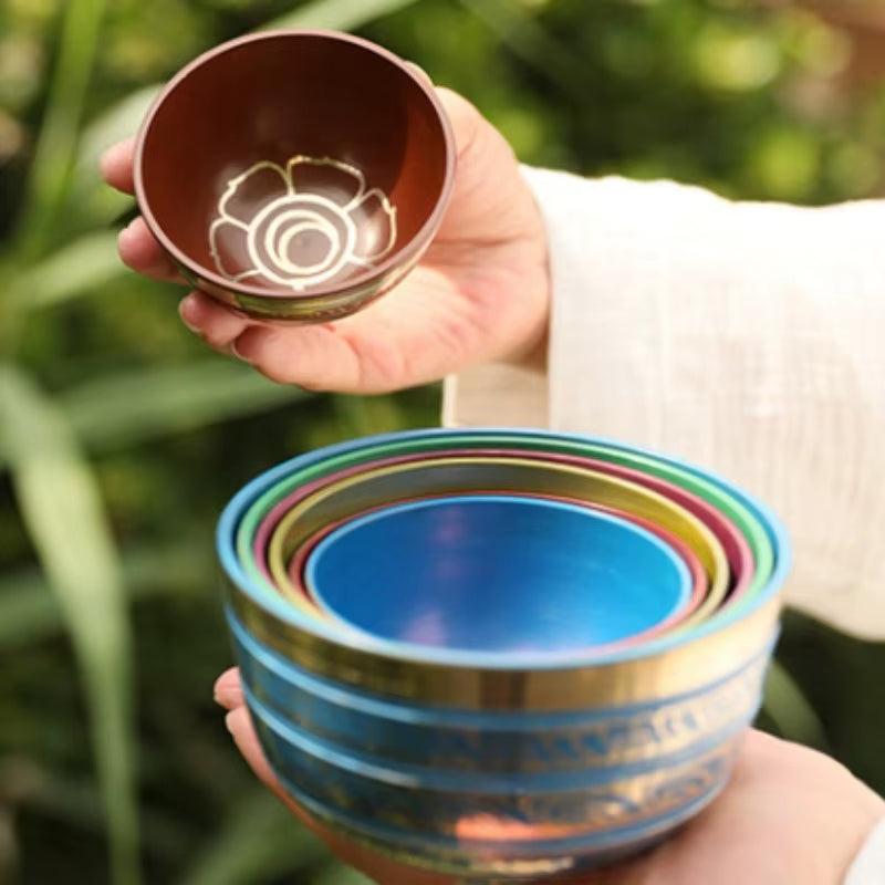 Colorful nested metal bowls with circular patterns in Tibetan Singing Bowl Set for Healing