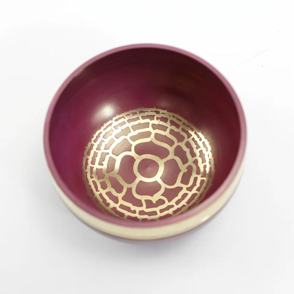 Burgundy ceramic bowl with golden geometric pattern in Tibetan Singing Bowl Set