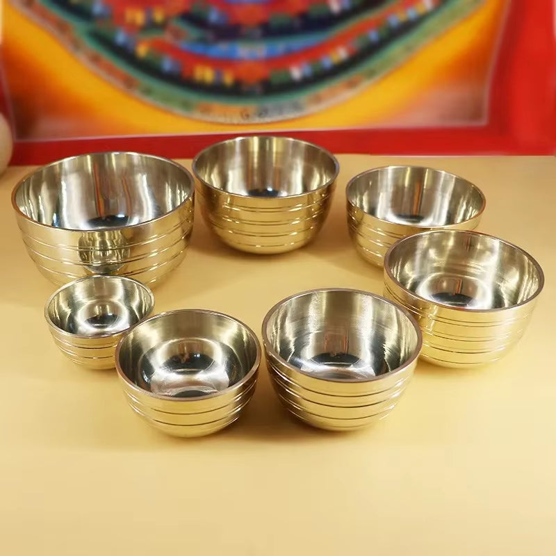 Set of six gold-colored Tibetan Singing Bowls with ribbed exterior for sound healing