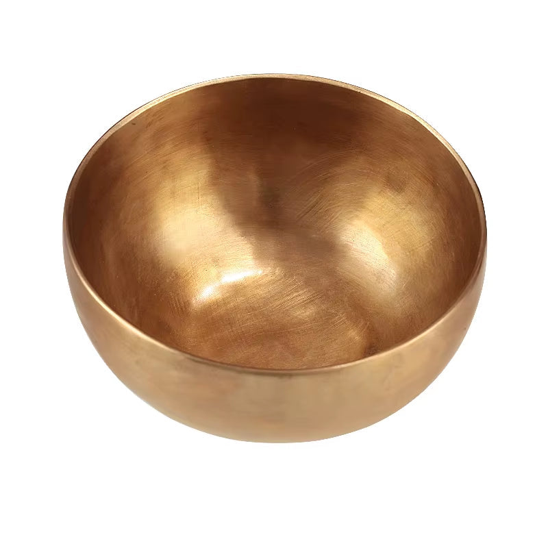 Golden Tibetan Singing Bowl with smooth metallic finish for meditation and healing