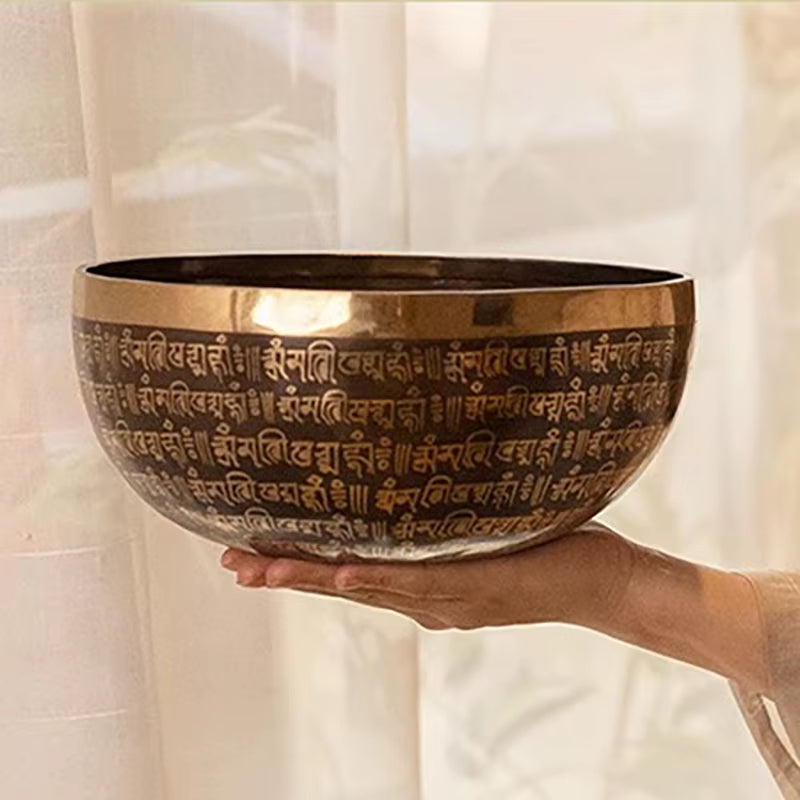 Tibetan singing bowl with Sanskrit inscriptions for meditation from Nepal