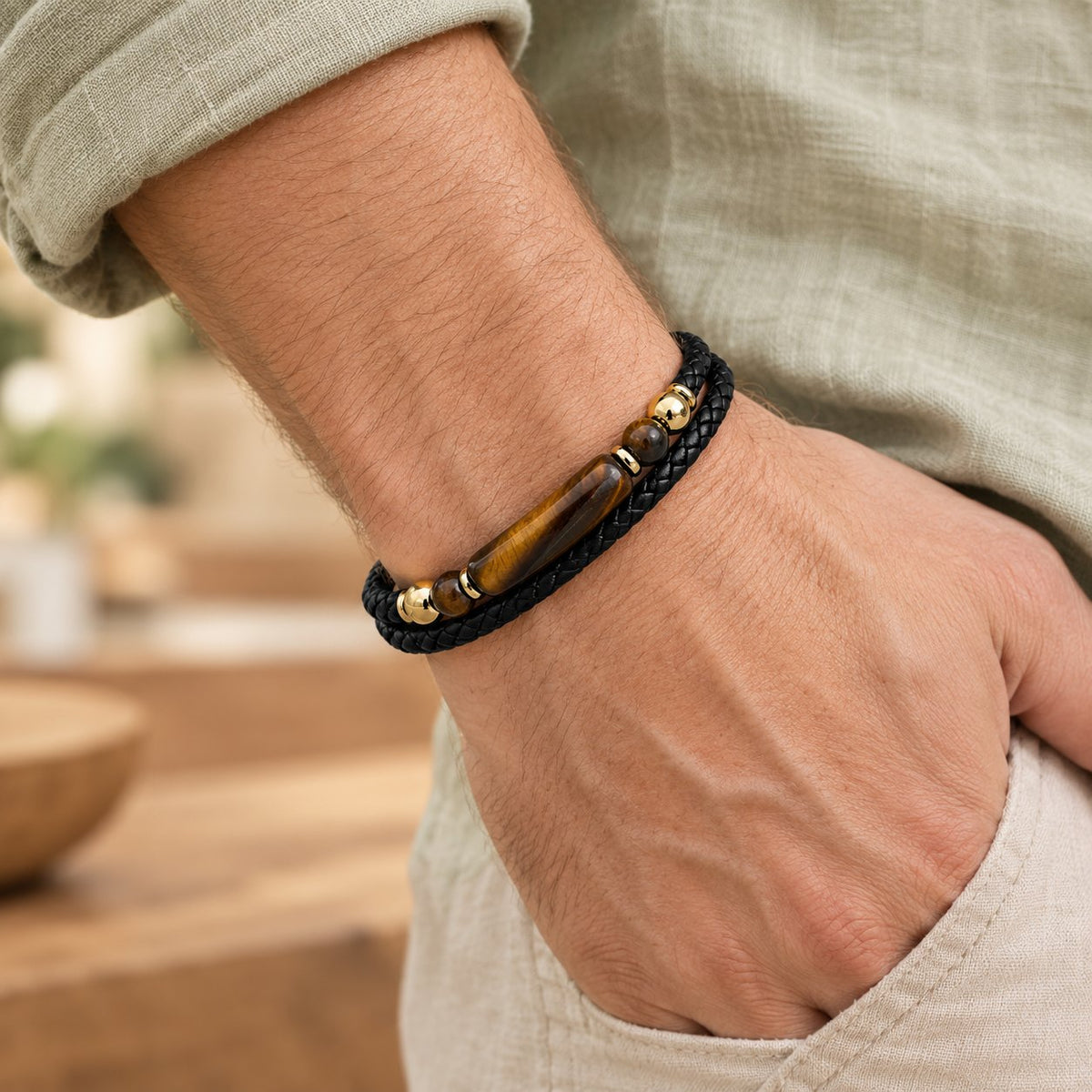Gold Tiger Eye Leather Bracelet with Magnetic Buckle for Luck & Protection, worn on the wrist by a man