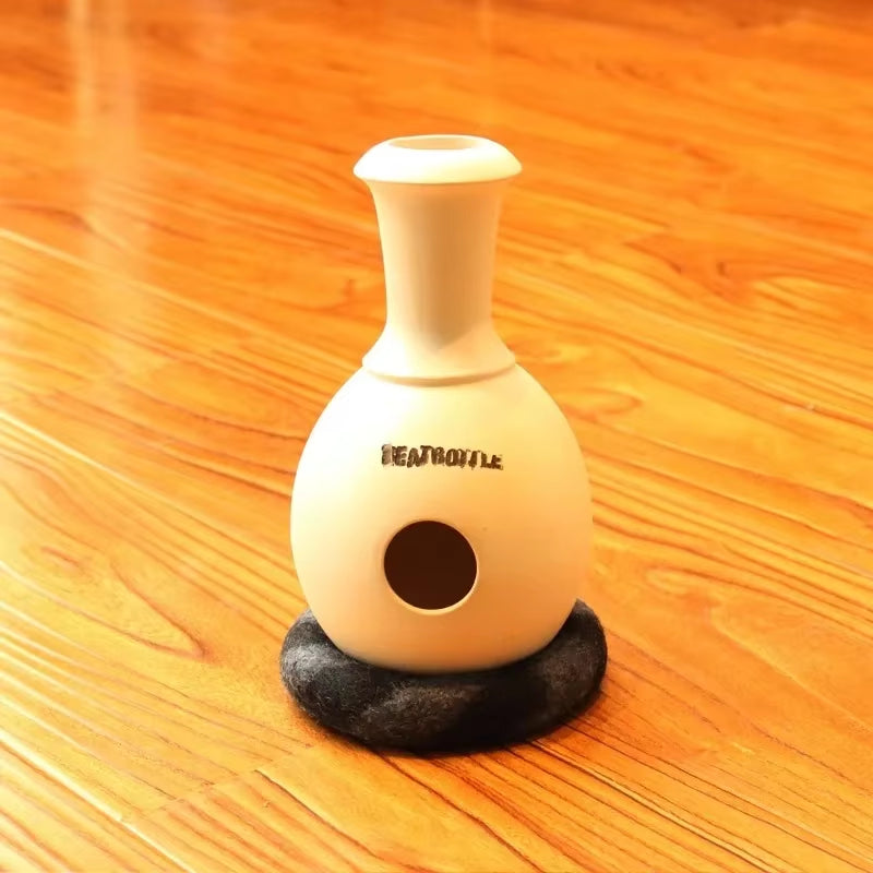 White ceramic vase with circular hole and black base for Udu Drum percussion