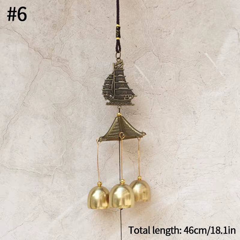 Vintage Metal Wind Chime featuring sailing ship design and three golden bells for garden decor
