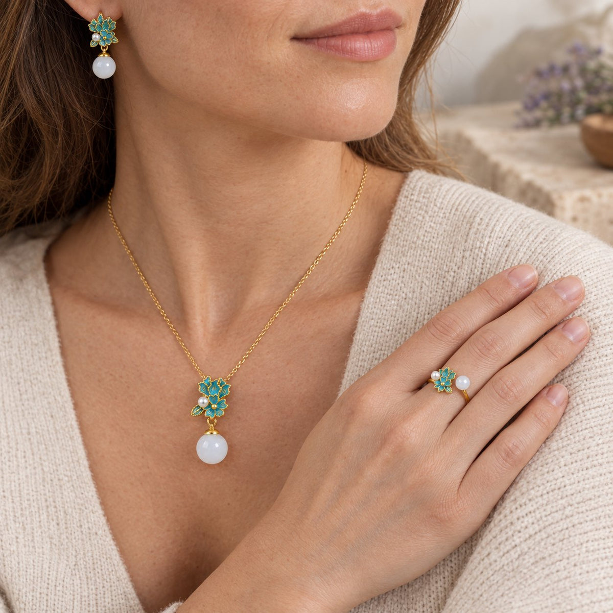 White Jade Silver Pearl Blessing Necklace Ring Earrings, held in the hand to show its real size